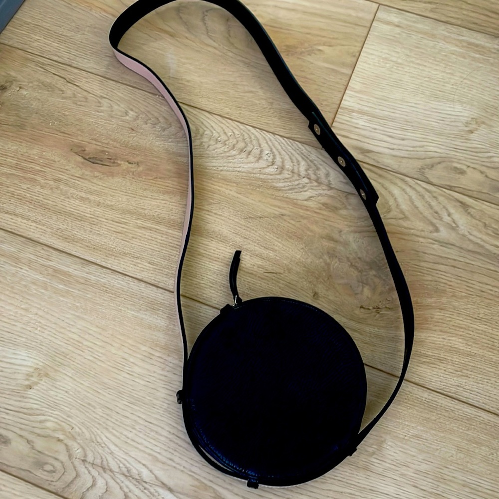 Like new Aqua Black round cross body with reversible strap
